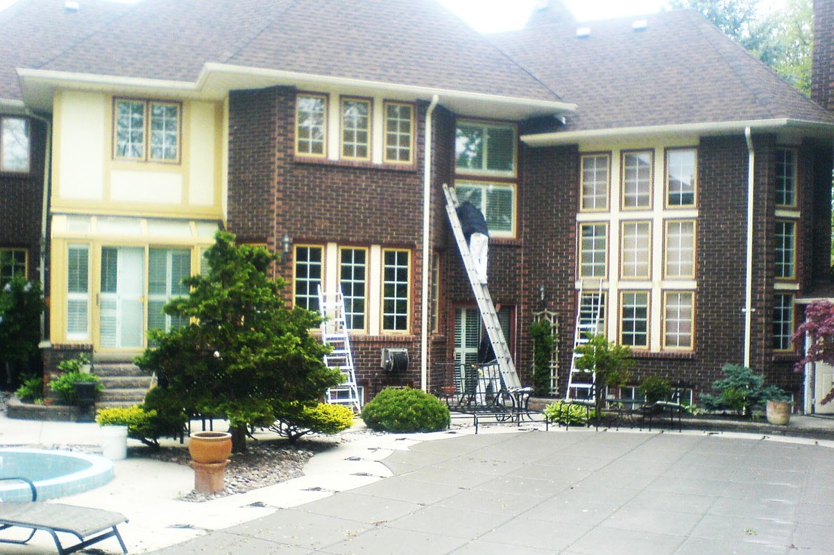 House Exterior Painting<br>• Before